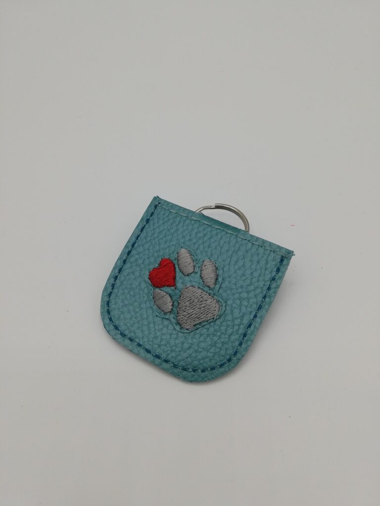 Antiklimpertäschchen "Pfote" türkis